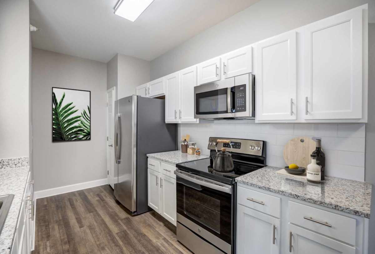 Stetson Ridge Apartments kitchen with white cabinets - Colorado Springs, CO