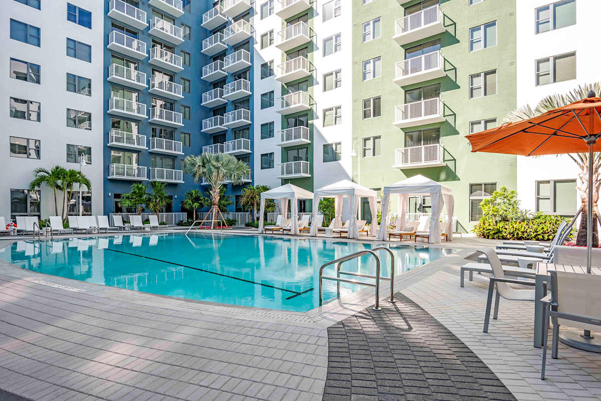 Lazul North Miami Beach Apartments pool deck lounge area - North Miami Beach, FL