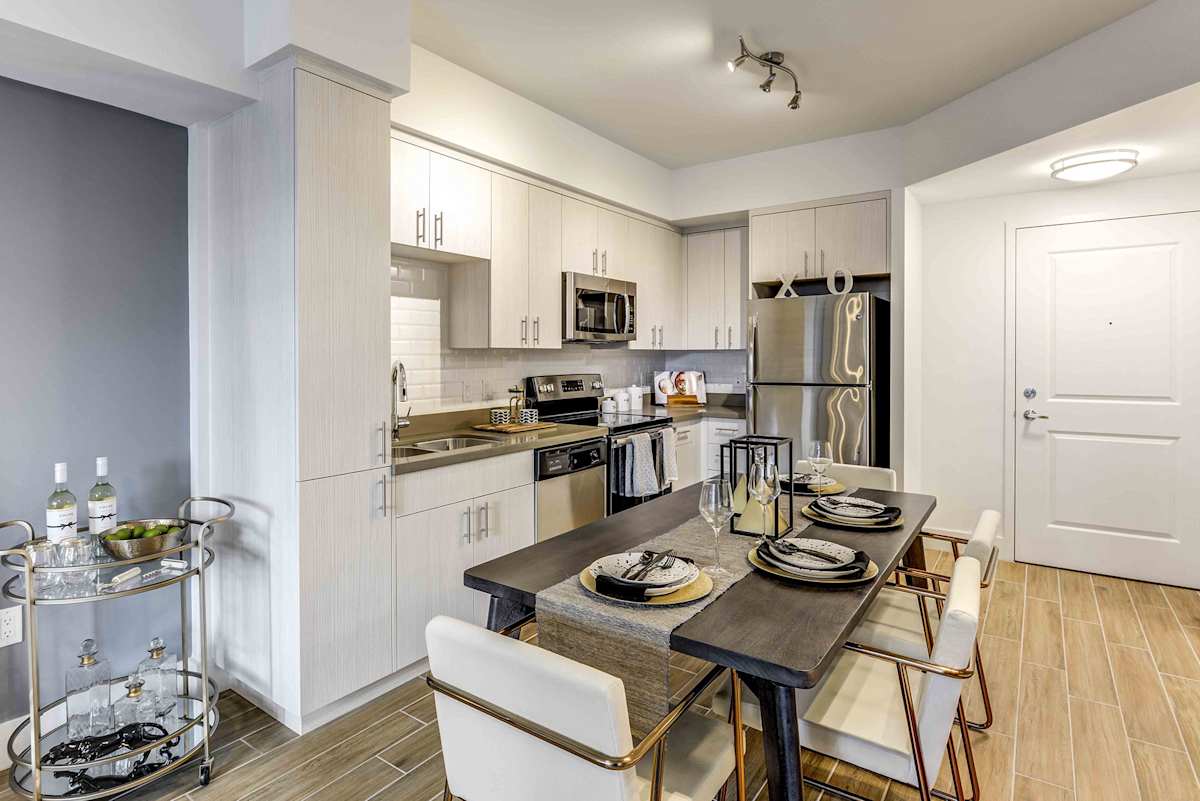 Lazul North Miami Beach Apartments kitchen with stainless appliances - North Miami Beach, FL