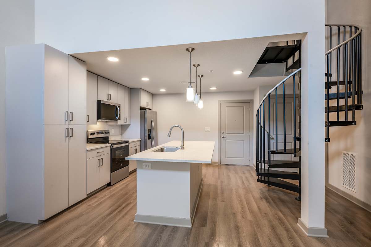 Madison Pointe Apartments kitchen with island - Daytona Beach, FL