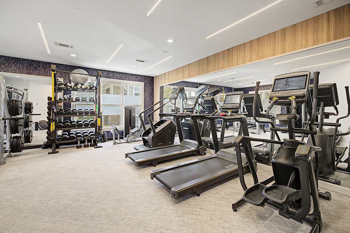 The Reserve at Meadowmont gym with treadmills and weights - Chapel Hill, NC