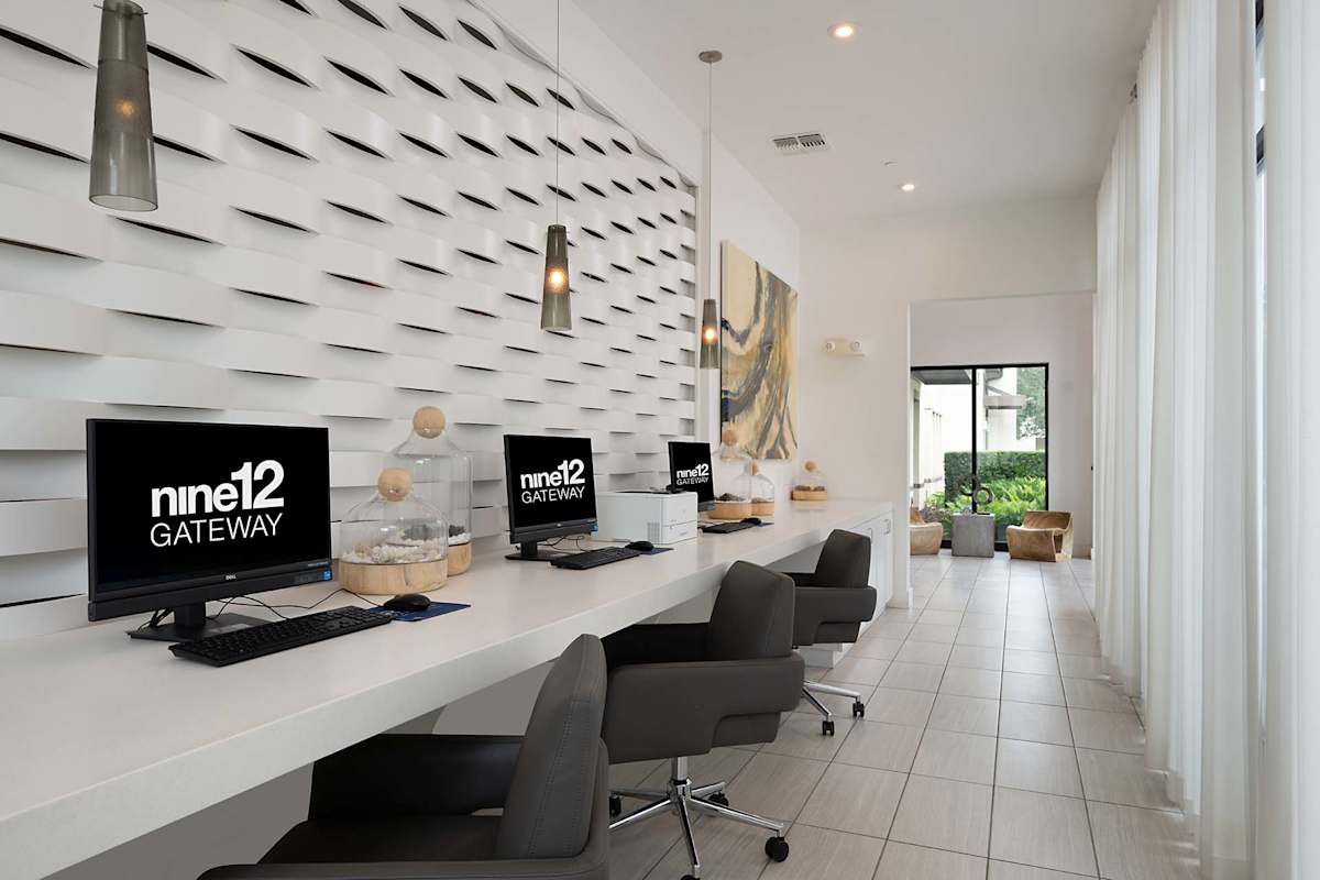 Nine12 Gateway Apartments business center workspace with desks - Altamonte Springs, FL