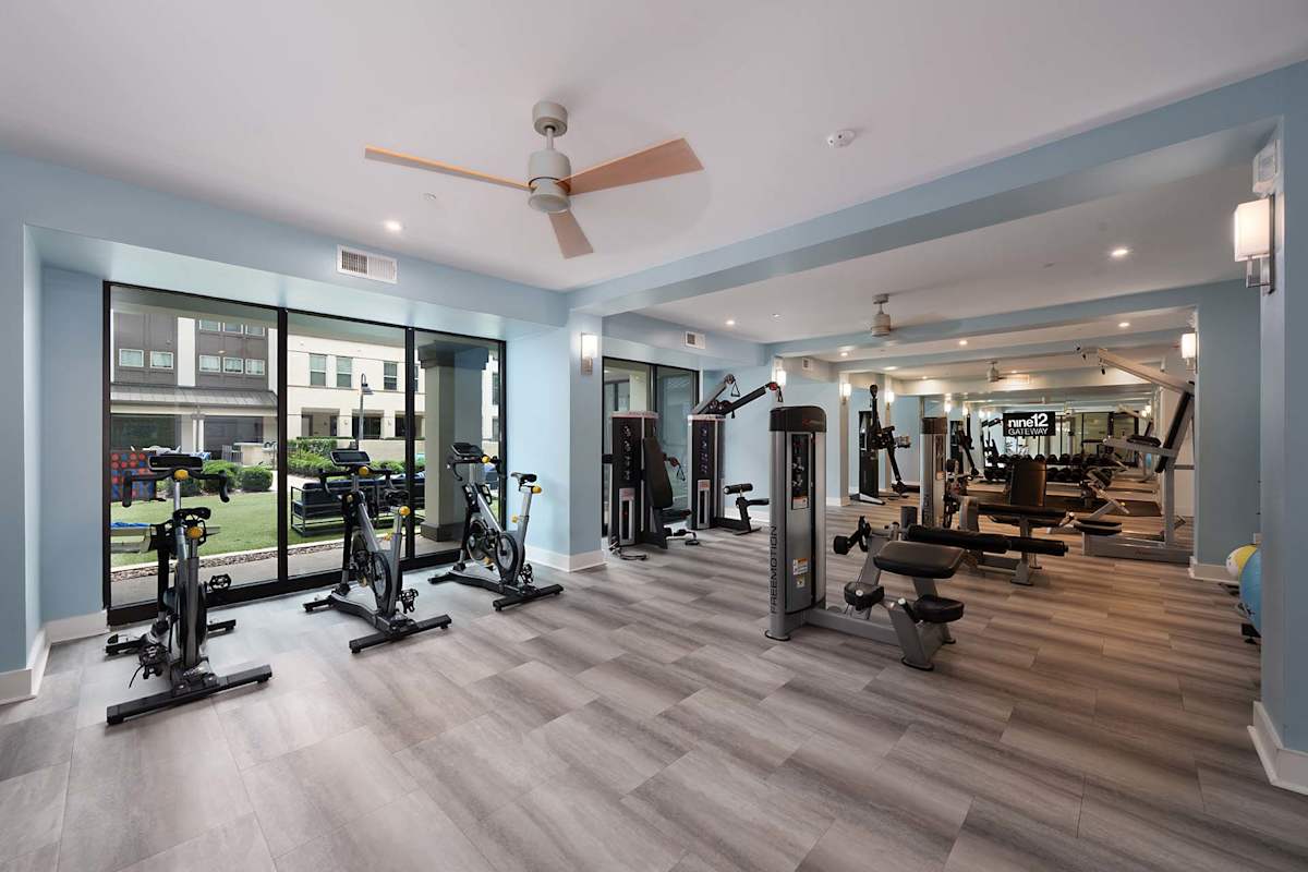 Nine12 Gateway Apartments fitness gym with equipment - Altamonte Springs, FL