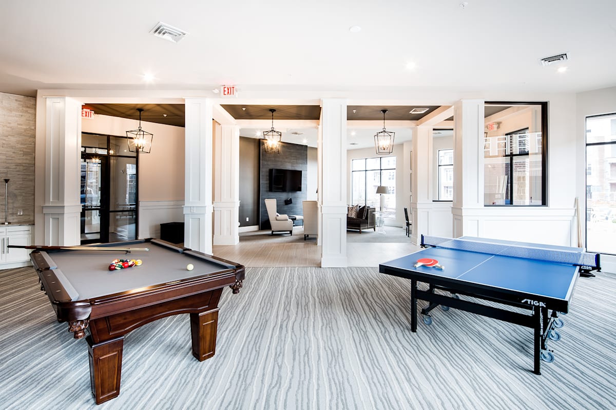 Holly Crest Apartments game room with tables - Huntersville, NC