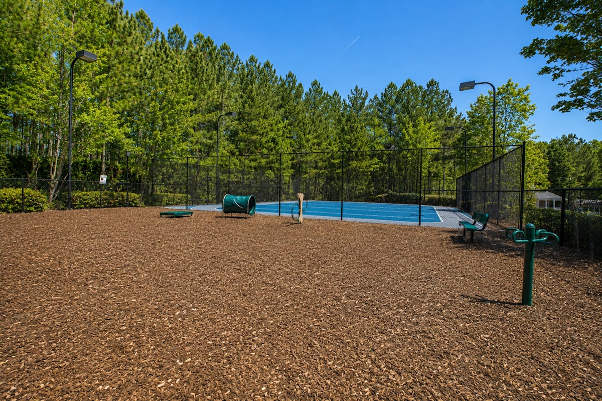 Orchard Springs Apartment Homes dog park area - Fairburn, GA