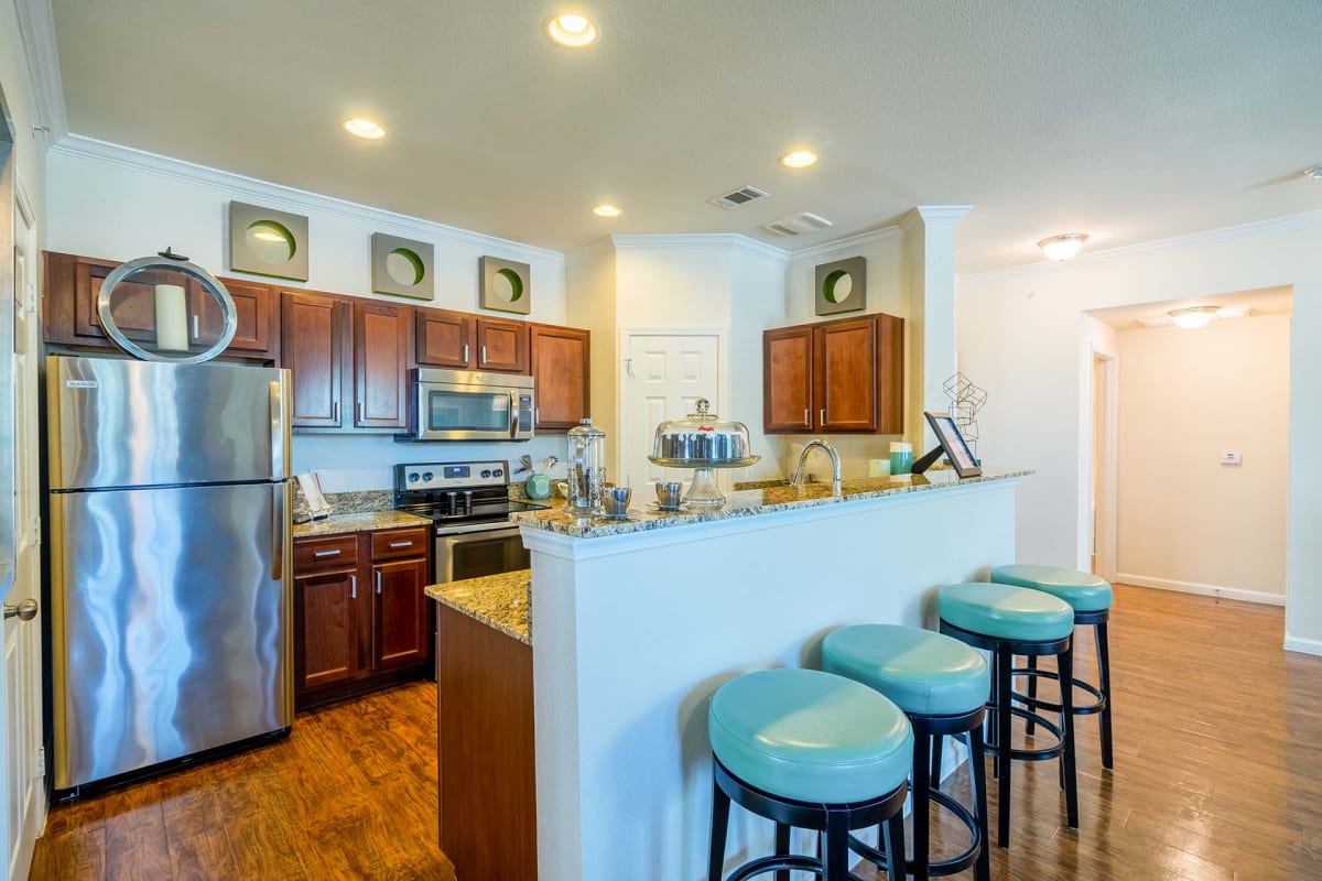 Orion Prosper Apartments kitchen with breakfast bar - Prosper, TX