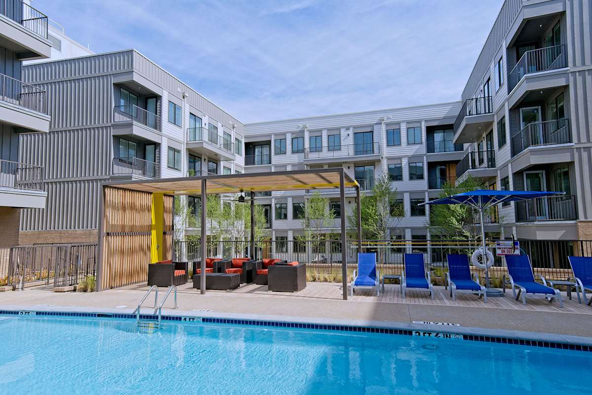 The Rise Apartments poolside seating area - Memphis, TN