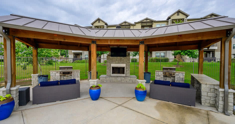 Verandas at Alamo Ranch covered patio with fireplace - San Antonio, TX