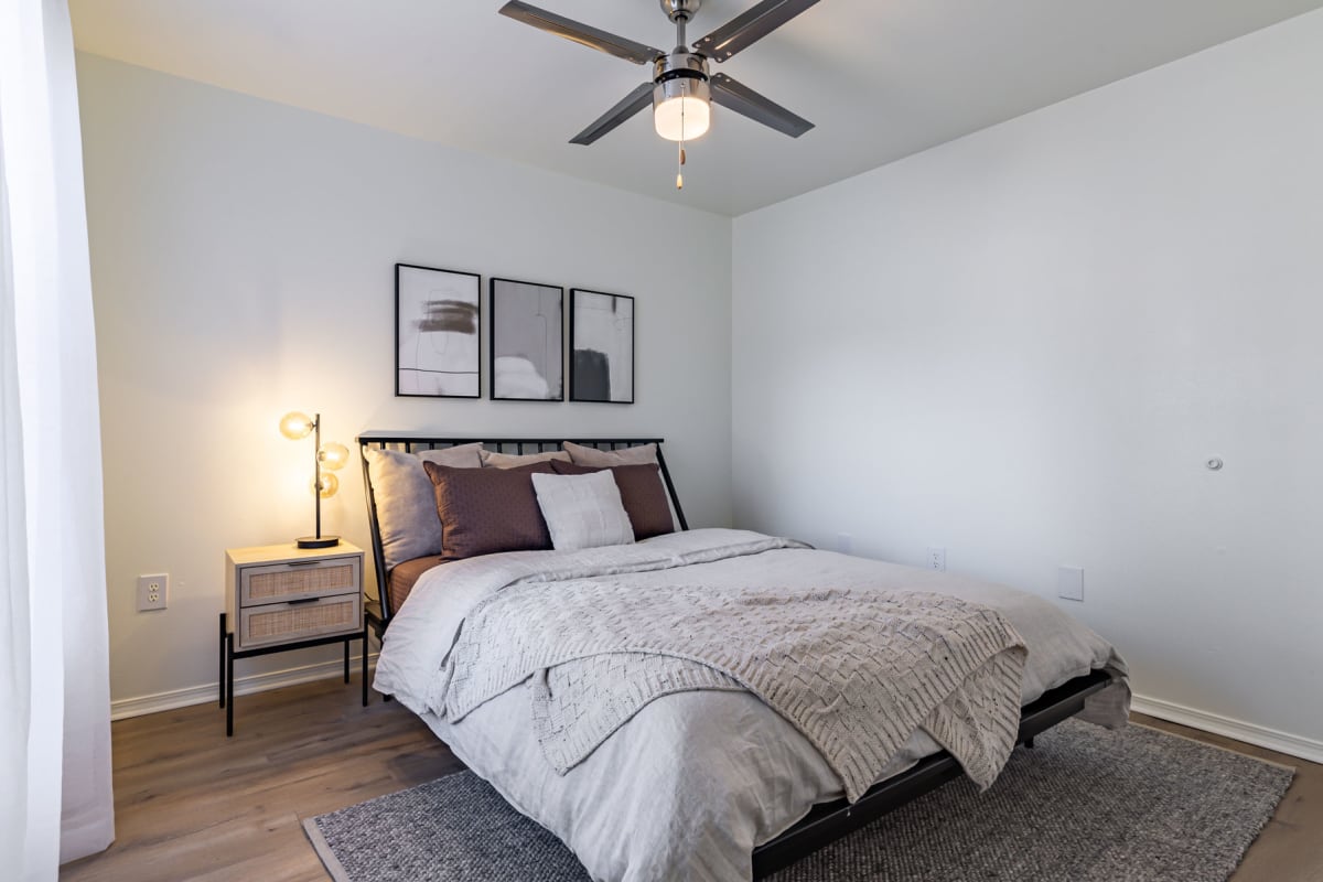 Revive Benton Apartments bedroom with ceiling fan - Benton, AR