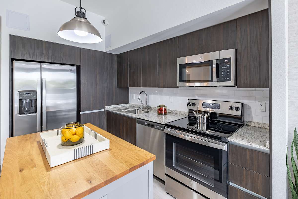 Solina Old Cutler Apartments kitchen with stainless steel appliances - Goulds, FL