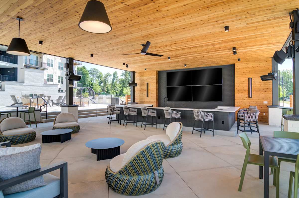 The Collier Sugar Hill Luxury Apartments clubhouse lounge seating - Sugar Hill, GA