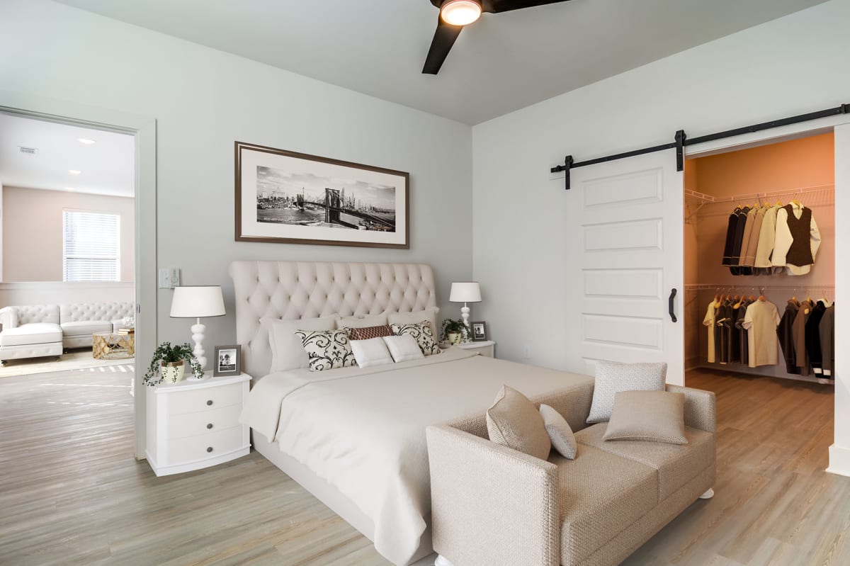 The Collins Luxury Apartments bedroom with ceiling fan - Huntsville, AL
