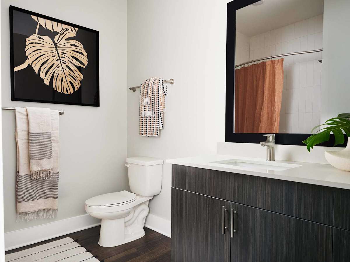 The Kelly at 23rd Luxury Apartments bathroom vanity and mirror - Panama City, FL