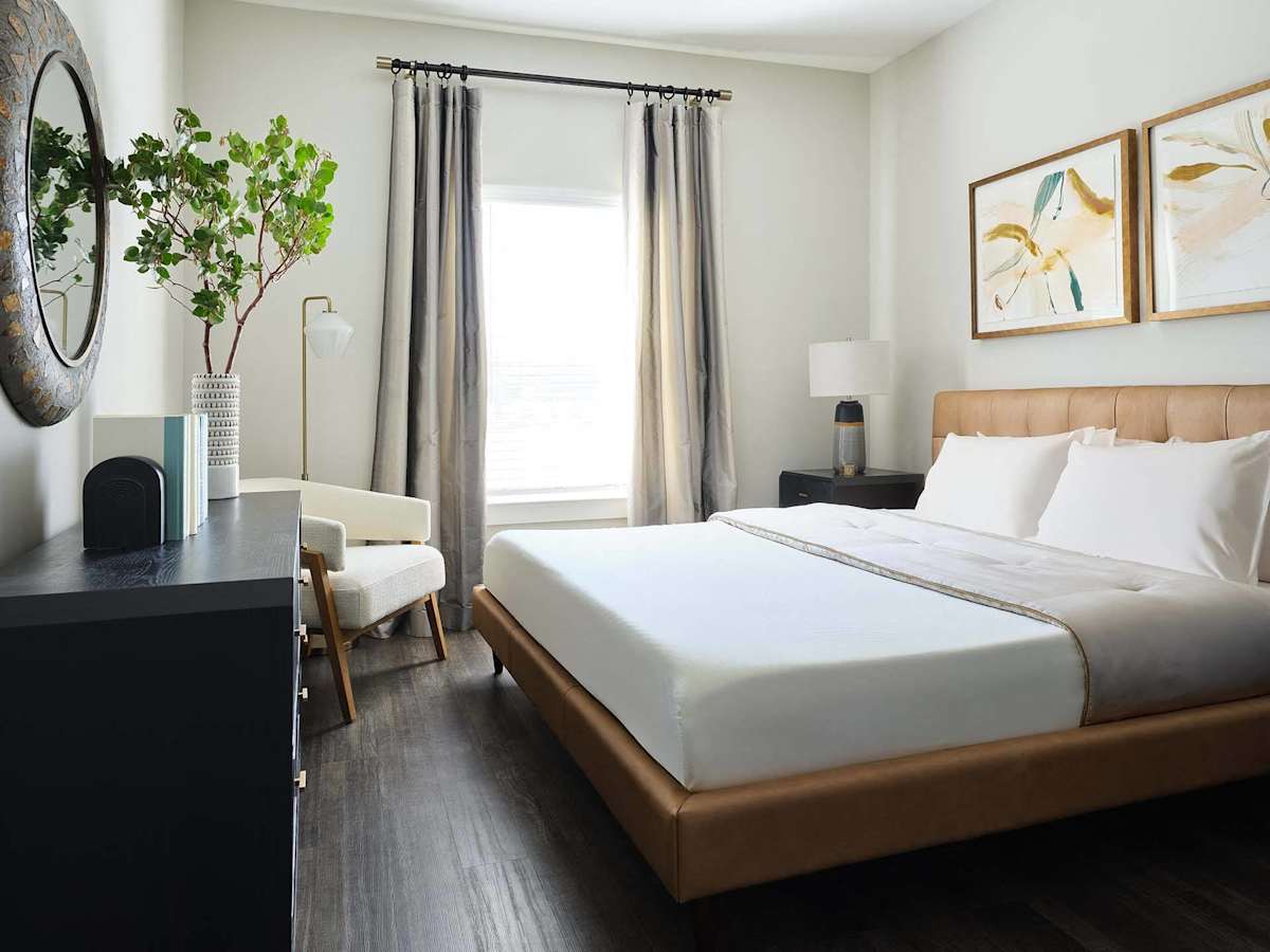 The Kelly at 23rd Luxury Apartments bedroom with large window - Panama City, FL