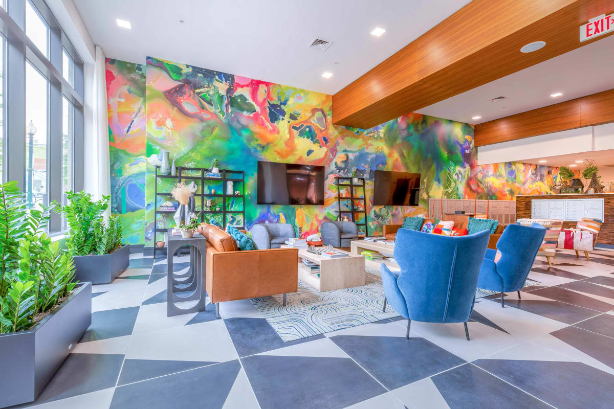 Terano Apartment Homes lobby with wall mural - Rockville, MD