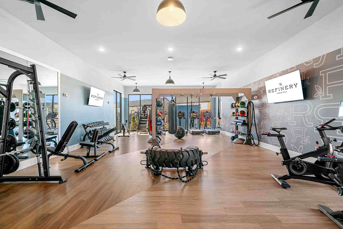 The Refinery at Sugar Hill Apartments and Townhomes fitness center - Sugar Hill, GA