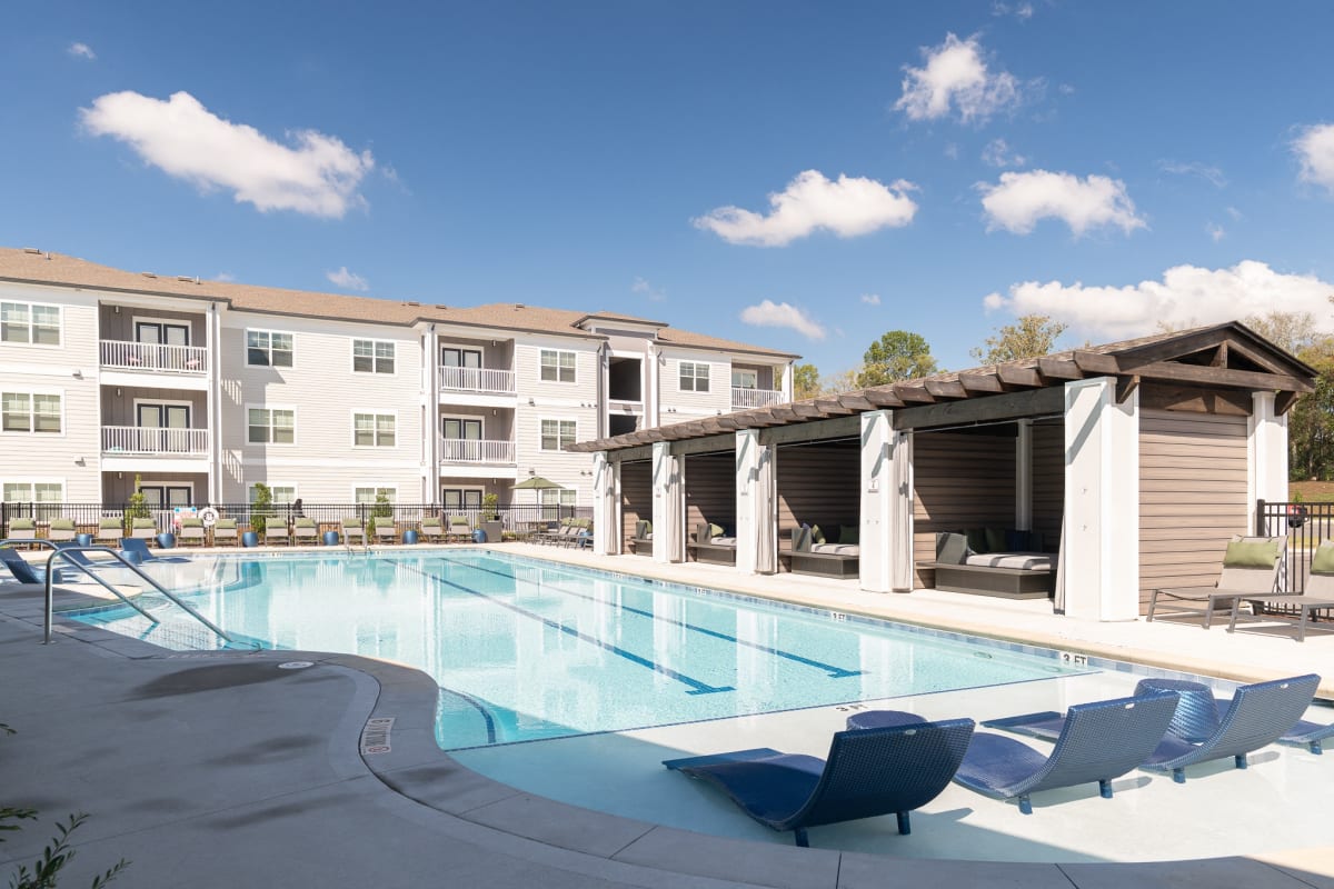 Vintage Cleveland Apartments swimming pool with lounge seating - Cleveland, TN