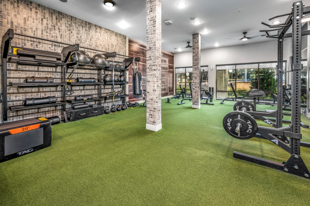 Vintage Lake Mary Apartments fitness center weights area - Sanford, FL