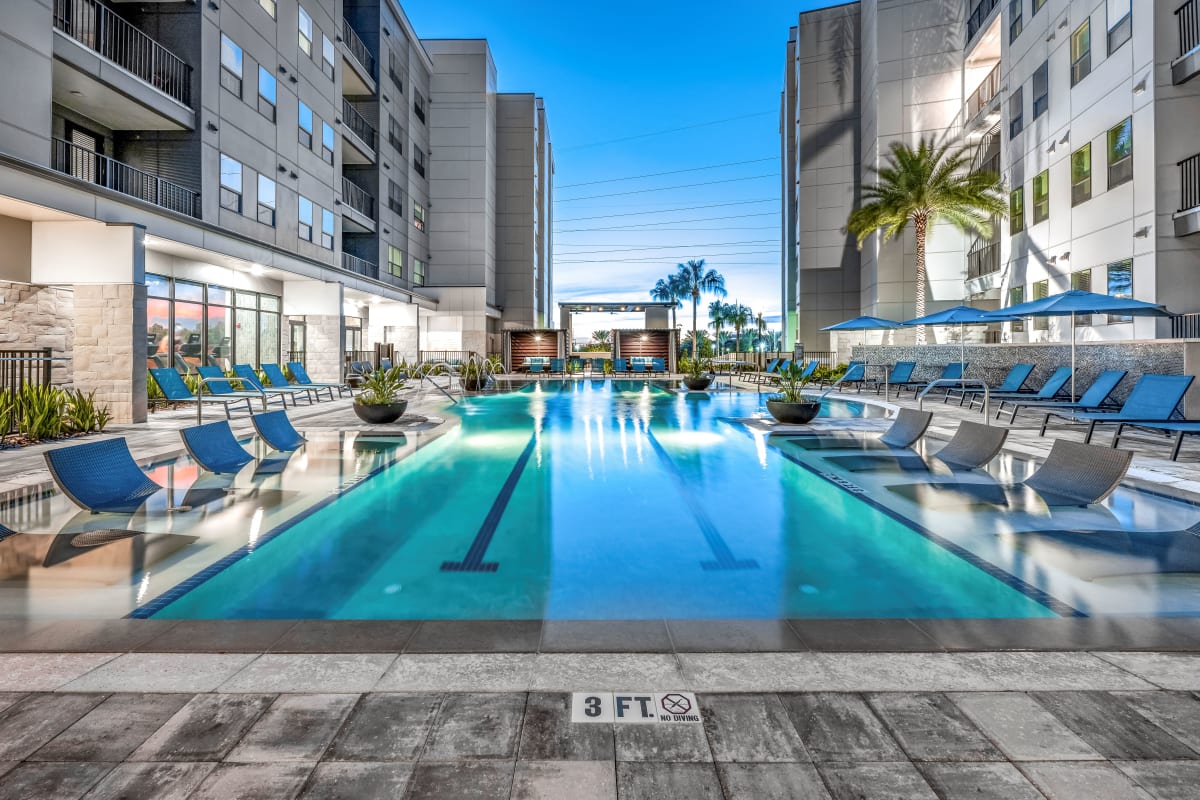 Vintage Lake Mary Apartments pool and lounge seating - Sanford, FL