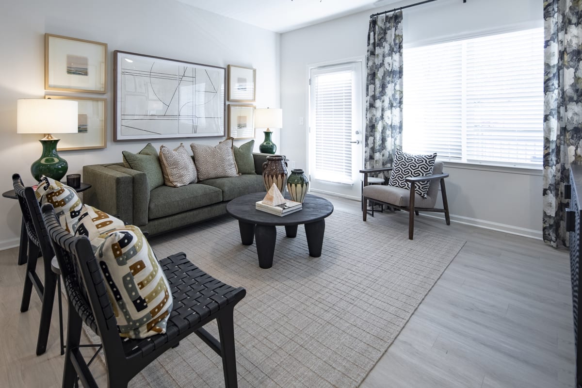 Waterleaf at Cold Springs apartment living room seating - Huntsville, AL