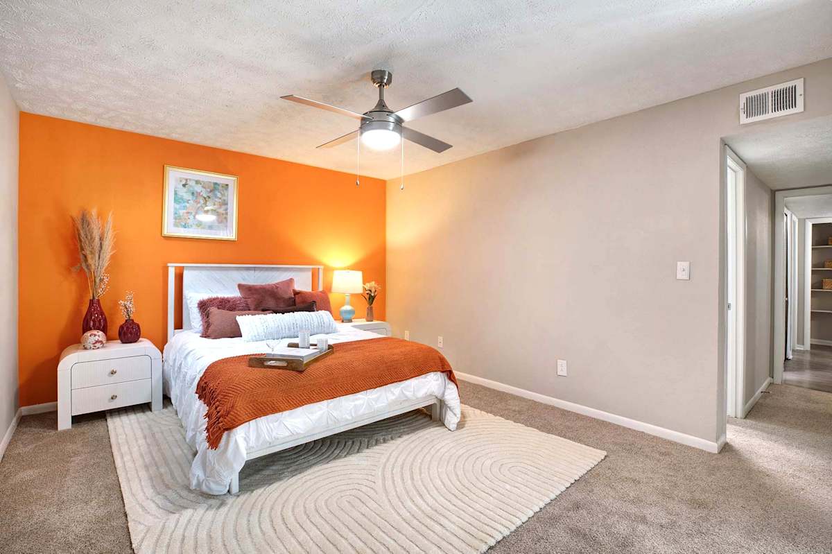 Waters Edge Apartments bedroom with accent wall - Sandy Springs, GA