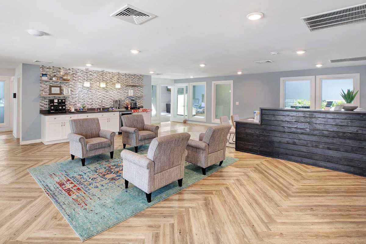 Waters Edge Apartments clubhouse lounge seating - Sandy Springs, GA
