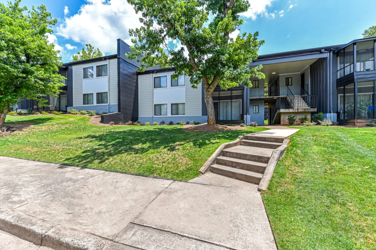 The Flats @ 1885 Apartments clubhouse exterior - Lake City, GA