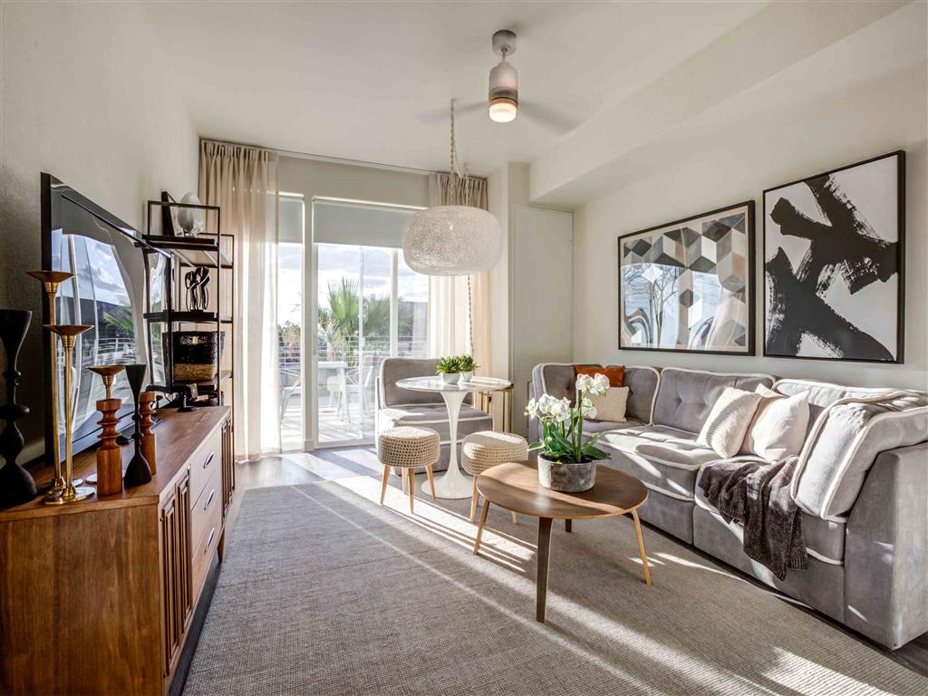 Furnished apartment living area shown at Circa Central Avenue.