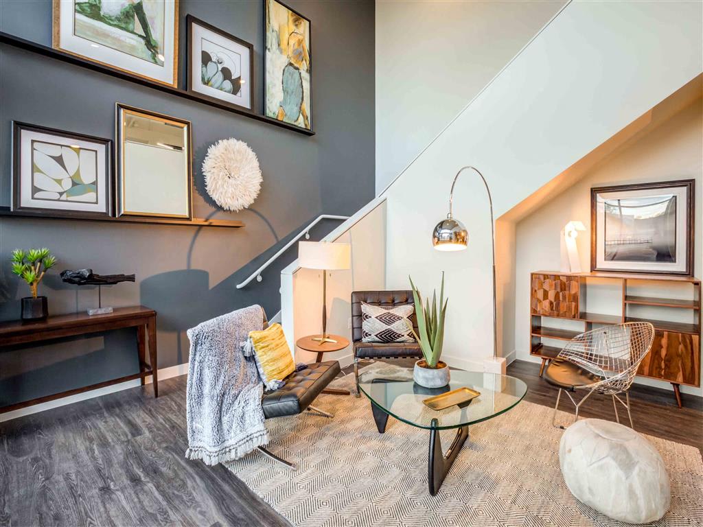 Furnished apartment living area shown at Circa Central Avenue.