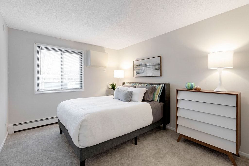 Tylia Apartments bedroom with queen bed - Maple Grove, MN