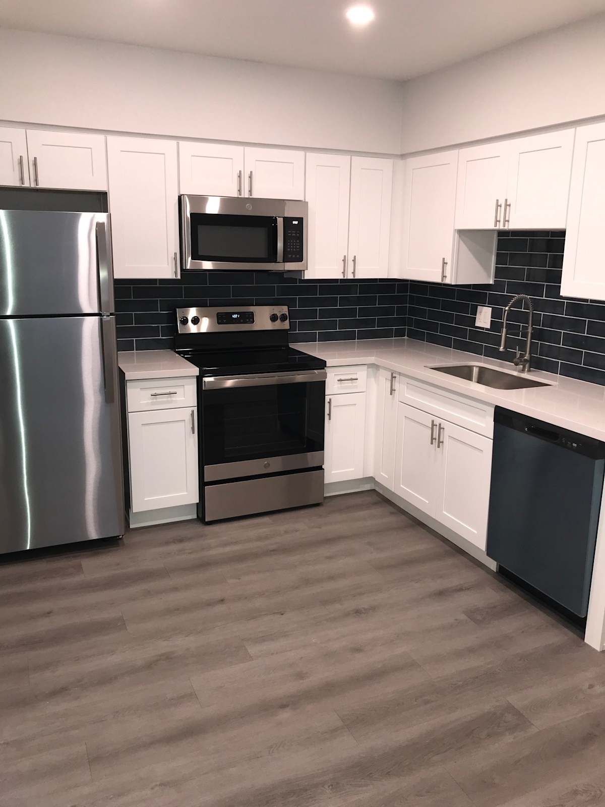 Apartment kitchen — representative home at East Vista.