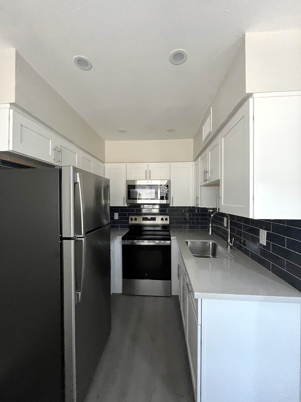 Apartment kitchen — representative home at East Vista.