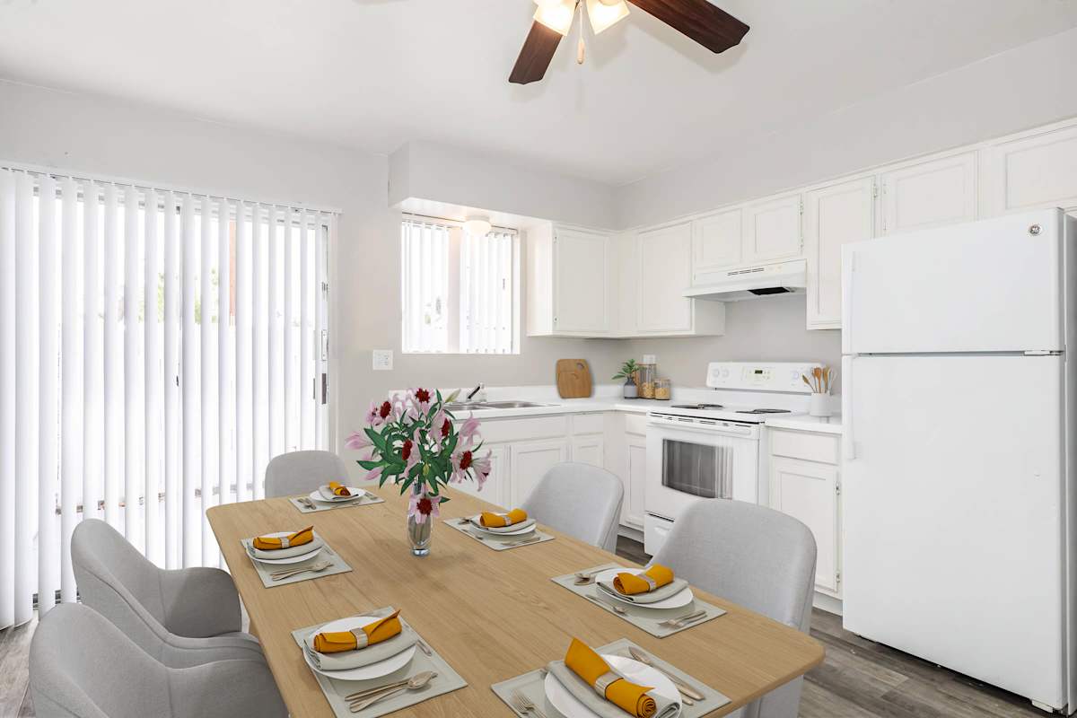 Furnished dining area shown at The Cara Apartments.