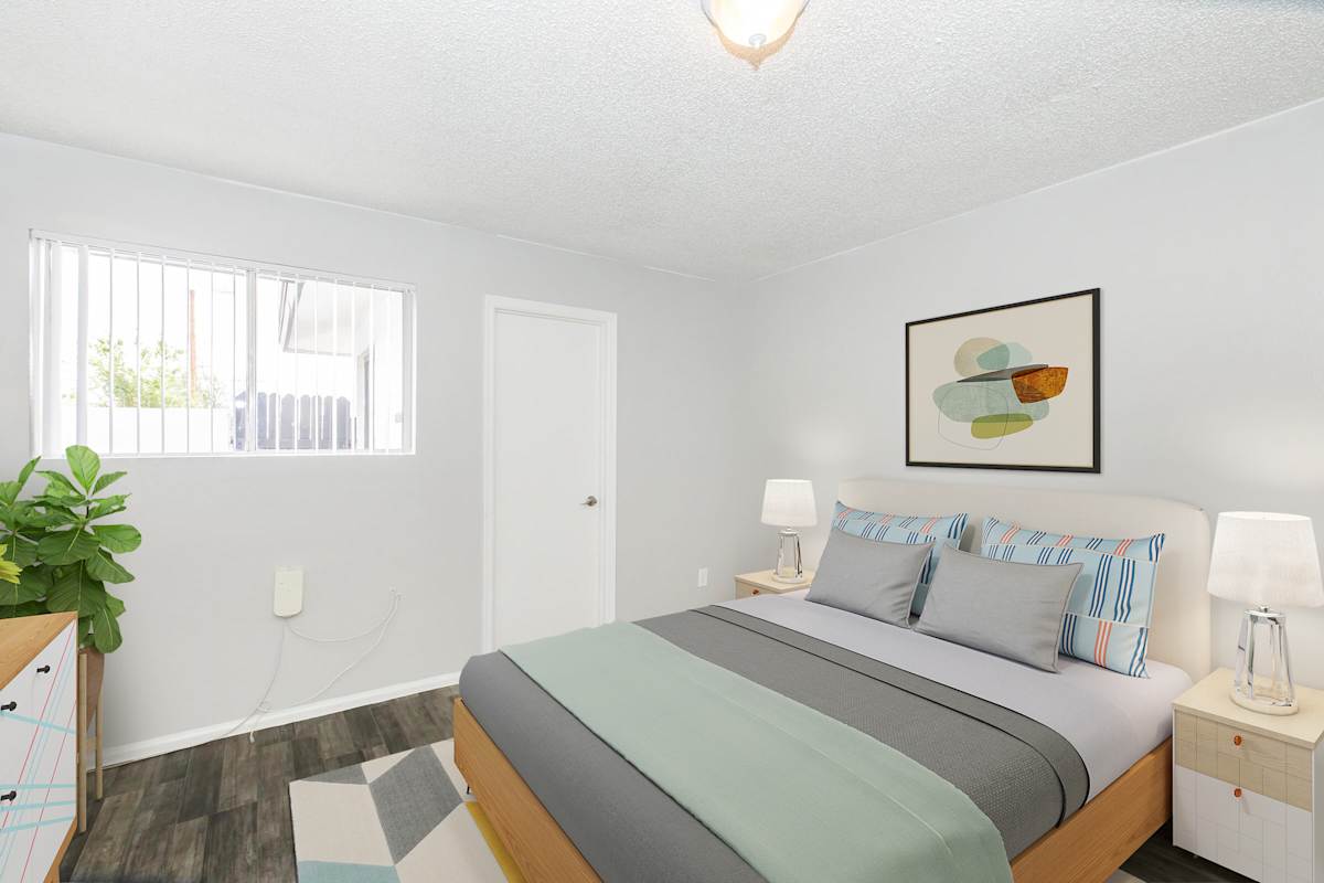 Furnished bedroom shown at The Cara Apartments.