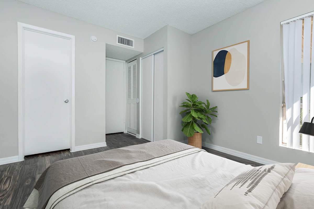 Furnished bedroom shown at The Cara Apartments.