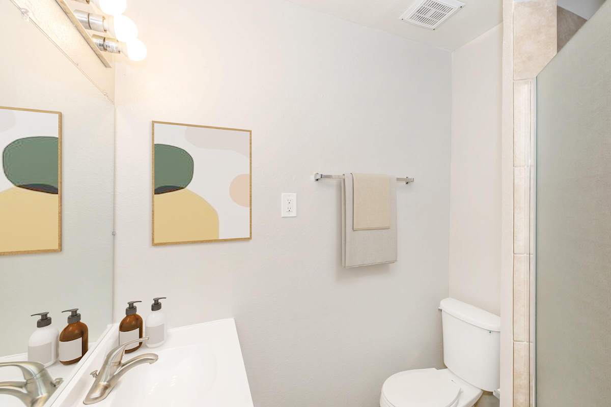 Apartment bathroom at The Cara Apartments.