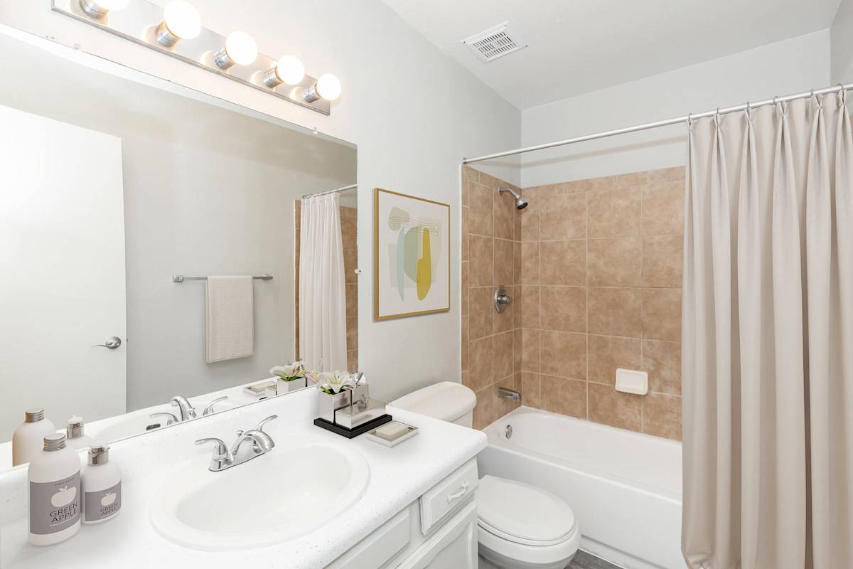 Apartment bathroom at The Cara Apartments.