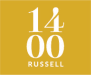 a white number one hundred and one on a yellow background  at 1400 Russell Apartments, Missouri