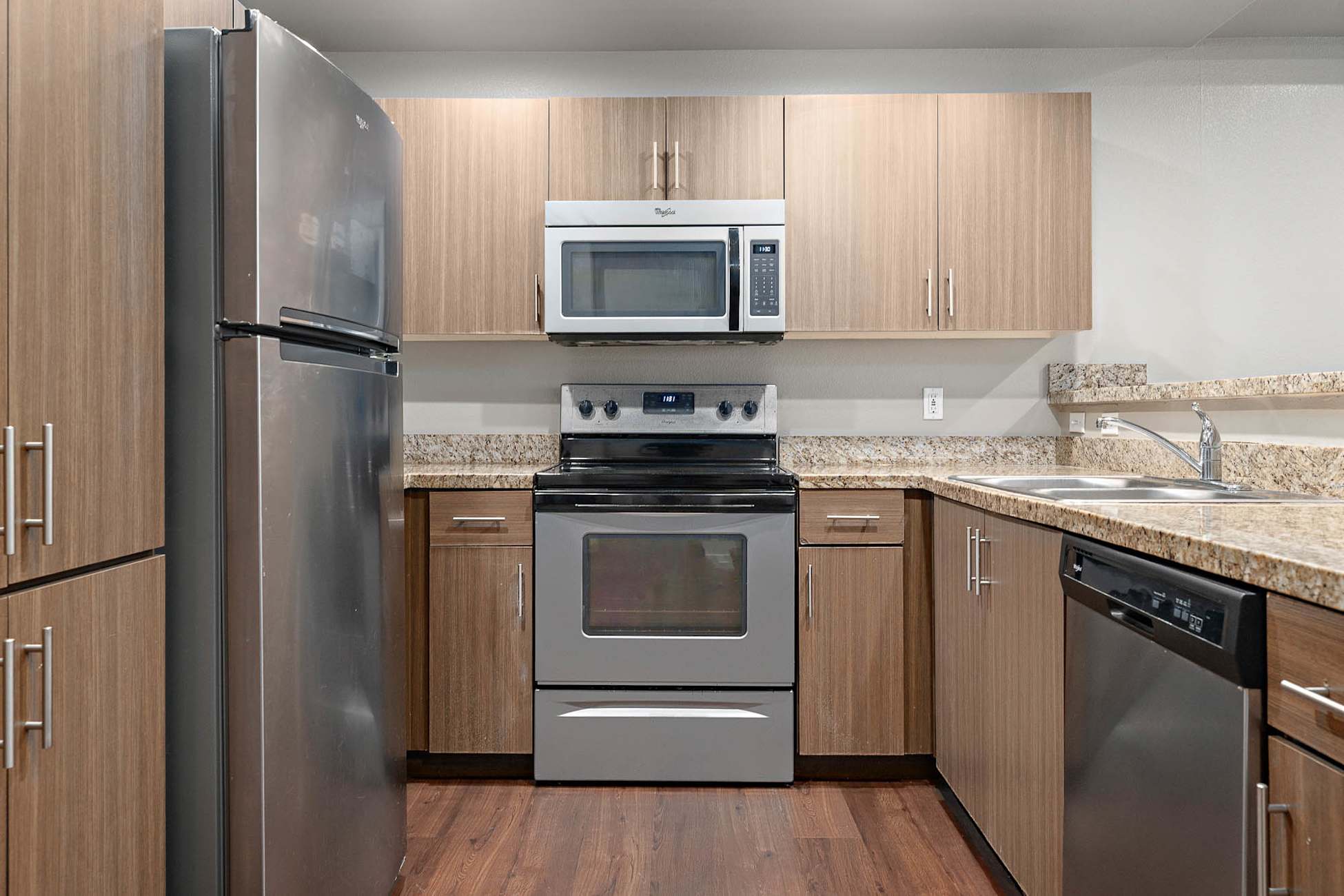 Apartment kitchen — representative home at Cobalt on 32nd Street.