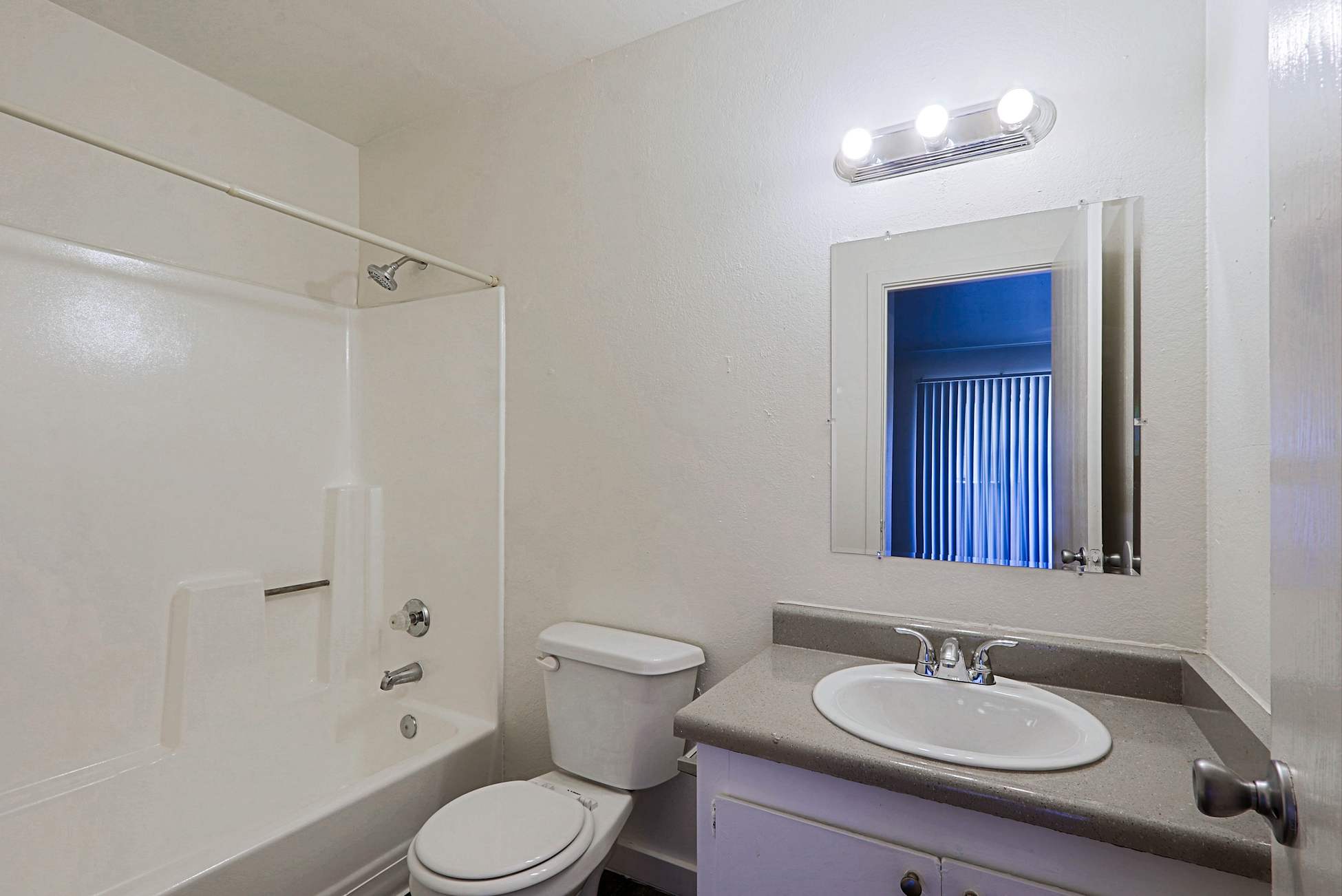 Apartment bathroom — representative home at Paradise Arbor.