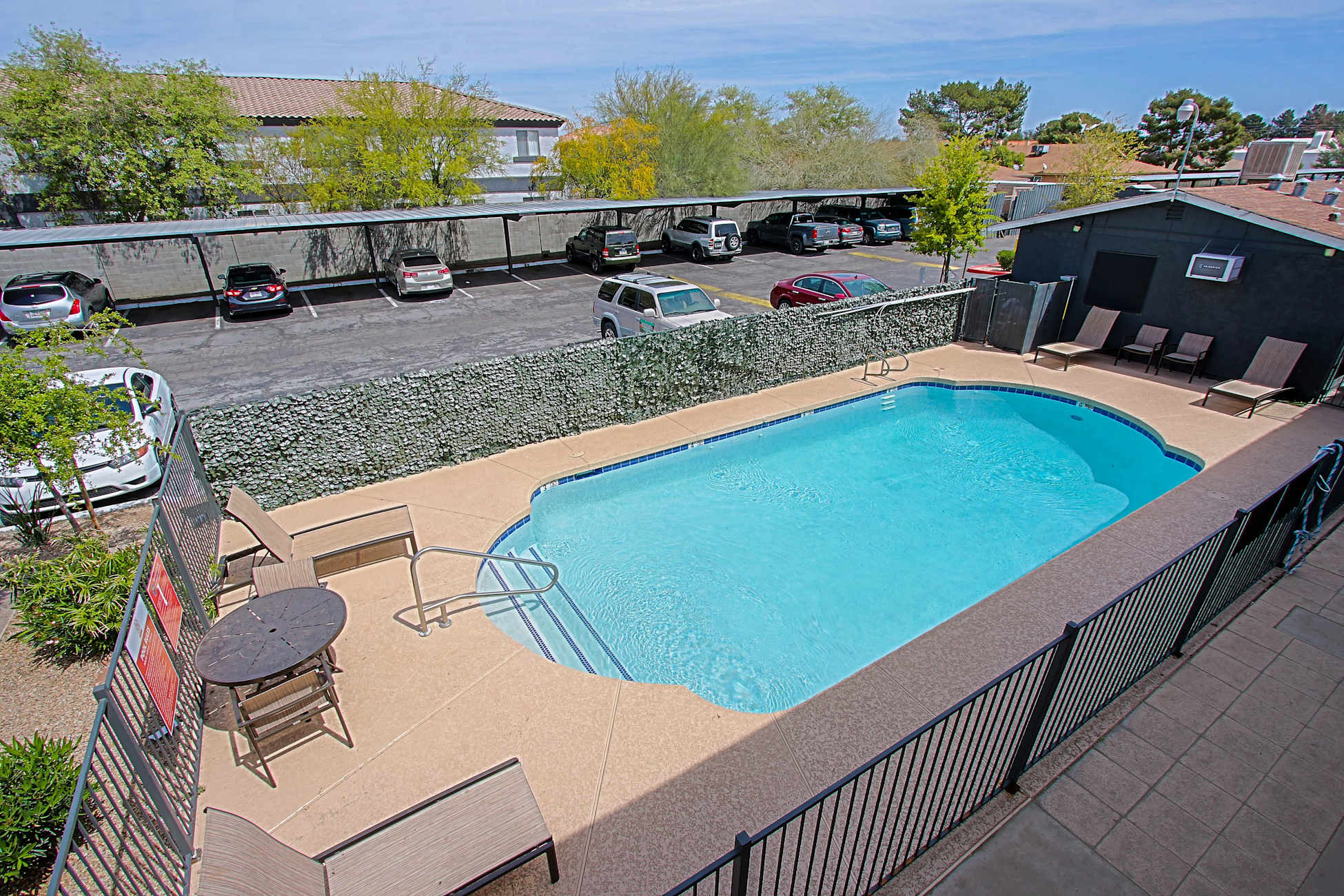 Pool and poolside area at Escarlata 29.