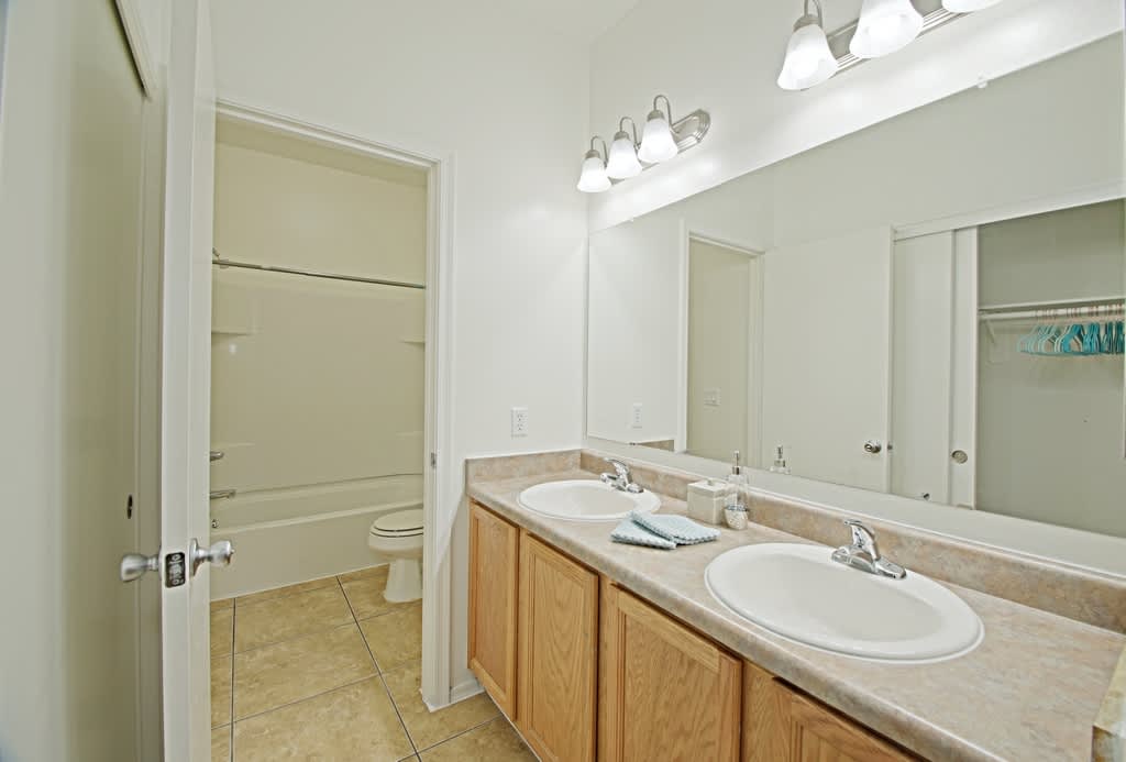 Apartment bathroom — representative home at Palo Brea.