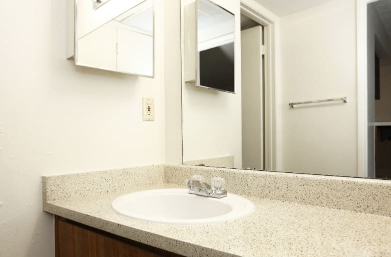 Apartment bathroom — representative home at The Summit Apartments.