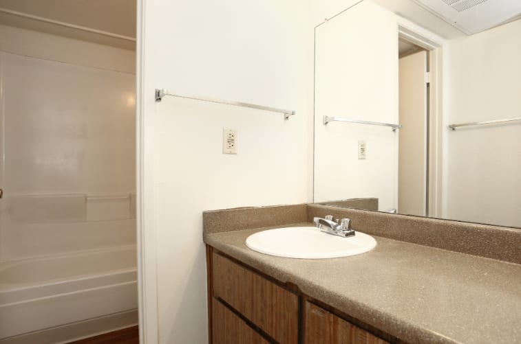 Apartment bathroom — representative home at The Summit Apartments.
