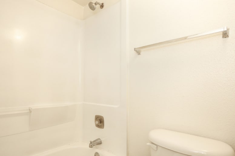 Apartment bathroom — representative home at The Summit Apartments.