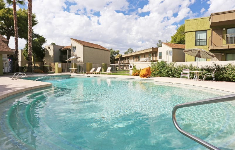 Pool and poolside area at The Summit Apartments.