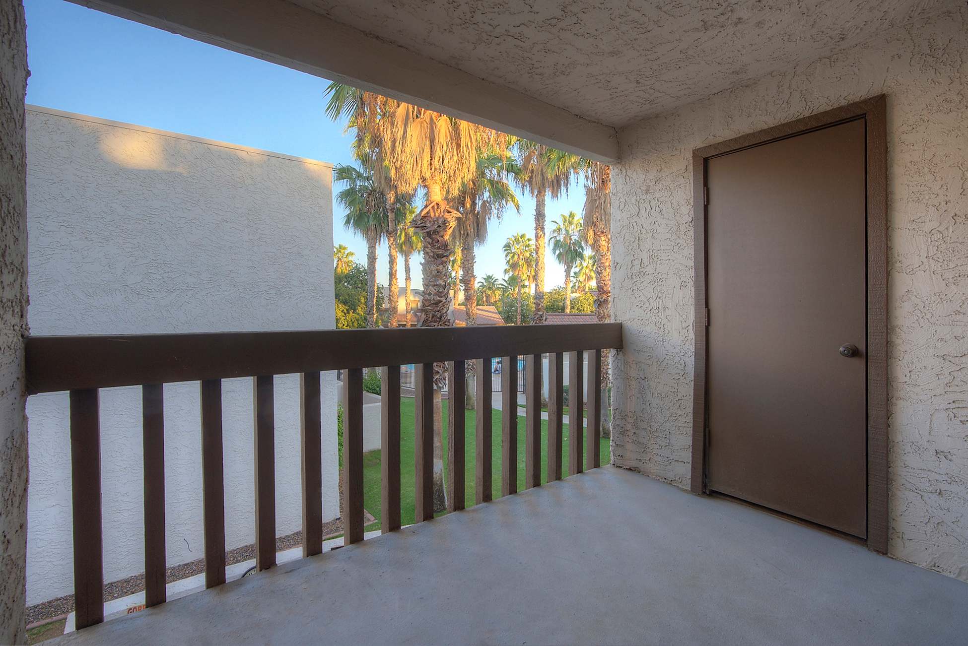 Balcony or patio at Townhomes on the Park Apartment Homes.