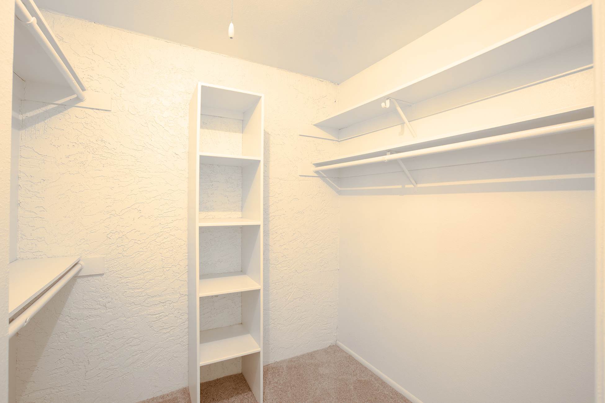 Closet storage — representative home at Townhomes on the Park Apartment Homes.