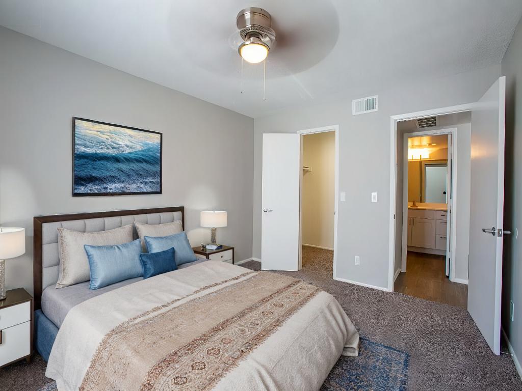 Furnished bedroom shown — representative home at Stonebridge.