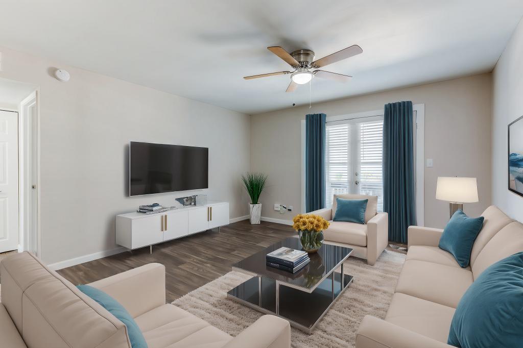 Furnished apartment living area shown — representative home at Stonebridge.